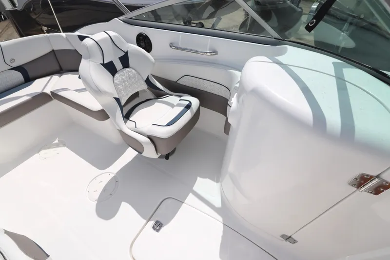 Slide: The Image of 2026 Hurricane SunDeck 2400 OB boat interior with sleek seating and modern design. - 7