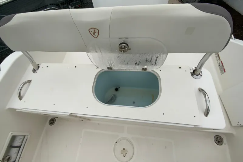 Slide: The Image of 2019 Century 2301 Center Console boat with open livewell and seating area. - 17
