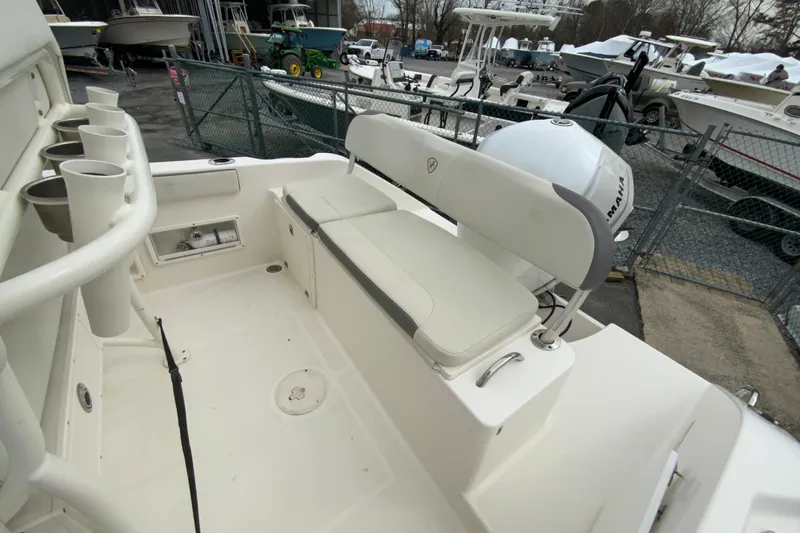 Slide: The Image of 2019 Century 2301 Center Console boat interior with seating and storage. - 18