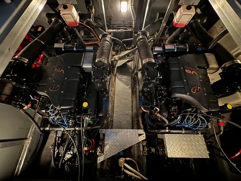 Slide: The Image of Engine room of 2000 Sea Ray 380 Sundancer with dual V8 engines. - 11