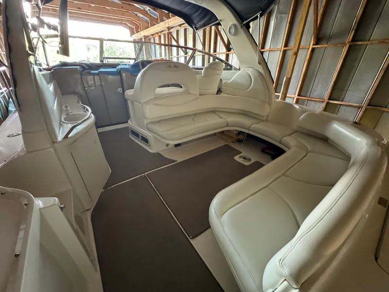Slide: The Image of Interior of 2000 Sea Ray 380 Sundancer yacht with luxurious seating and modern design. - 3