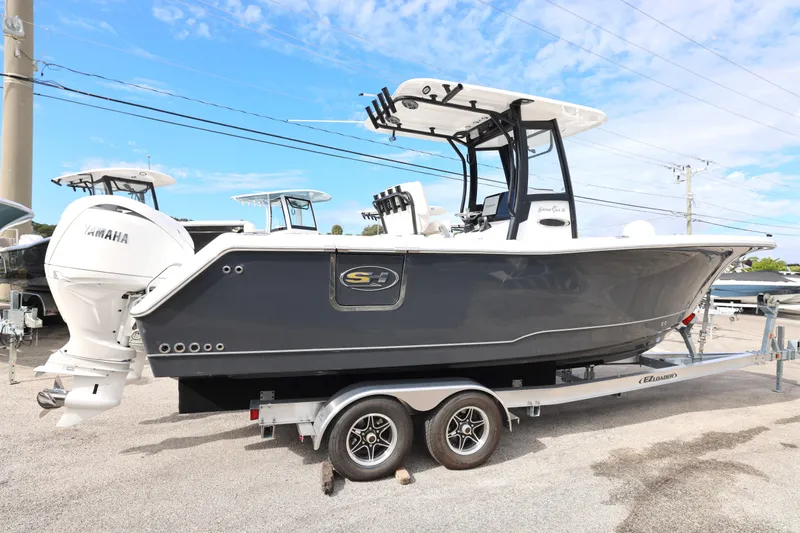 Slide: The Image of 2026 Sea Hunt Gamefish 25 on trailer, side view. - 22