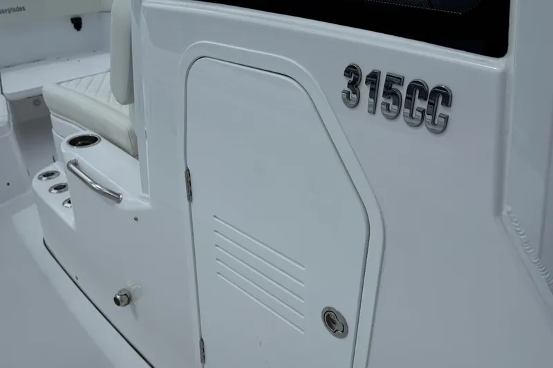 Slide: The Image of 2026 Everglades 315 Center Console boat interior detail with model number. - 20