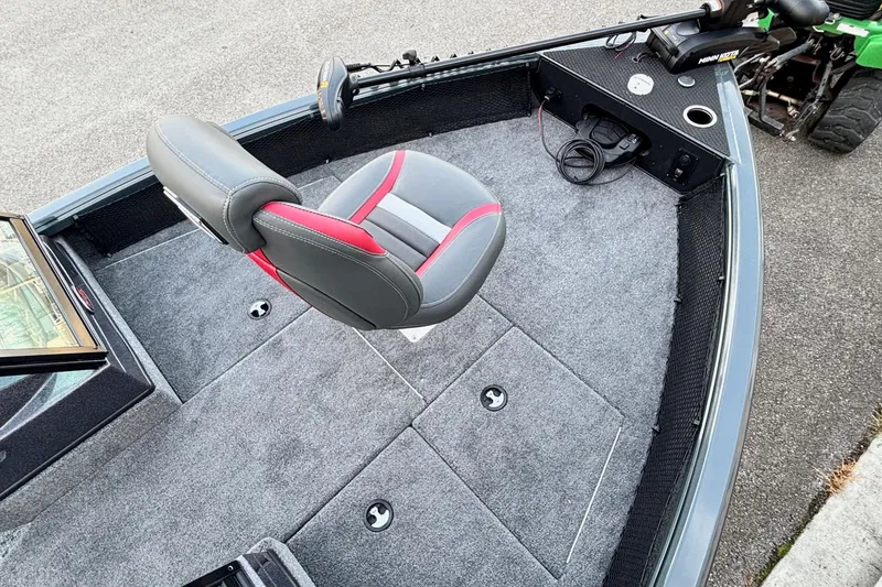 Slide: The Image of 2026 Ranger VS1782SC Reata boat interior with gray and red seating, carpeted deck. - 3