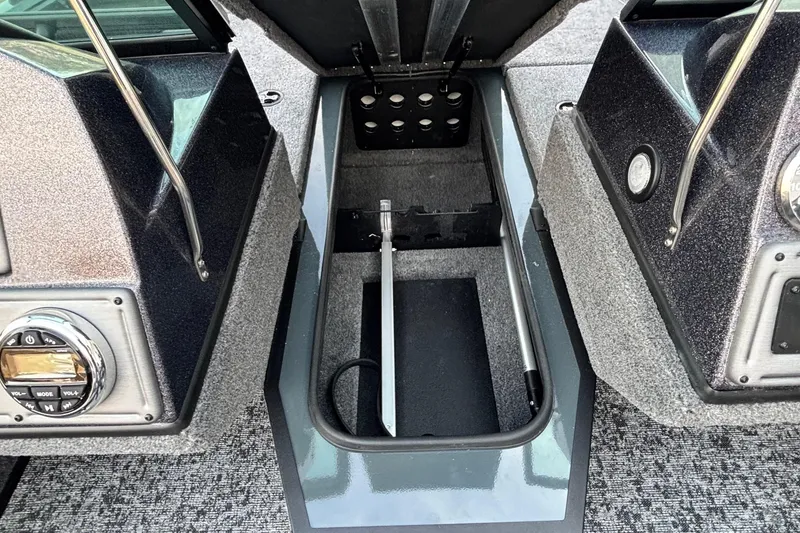 Slide: The Image of 2026 Ranger VS1782SC Reata boat interior storage compartment with control panel. - 5