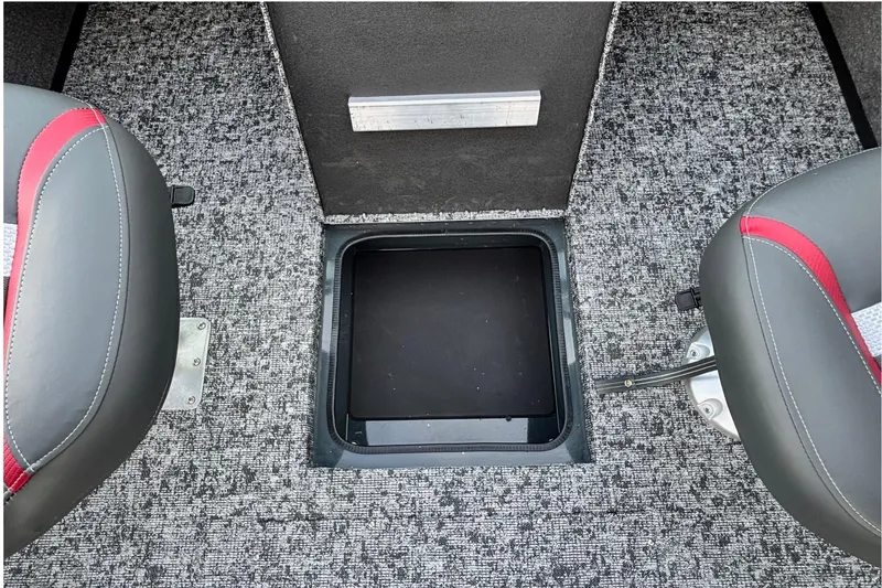 Slide: The Image of 2026 Ranger VS1782SC Reata boat interior with storage compartment and seating. - 9