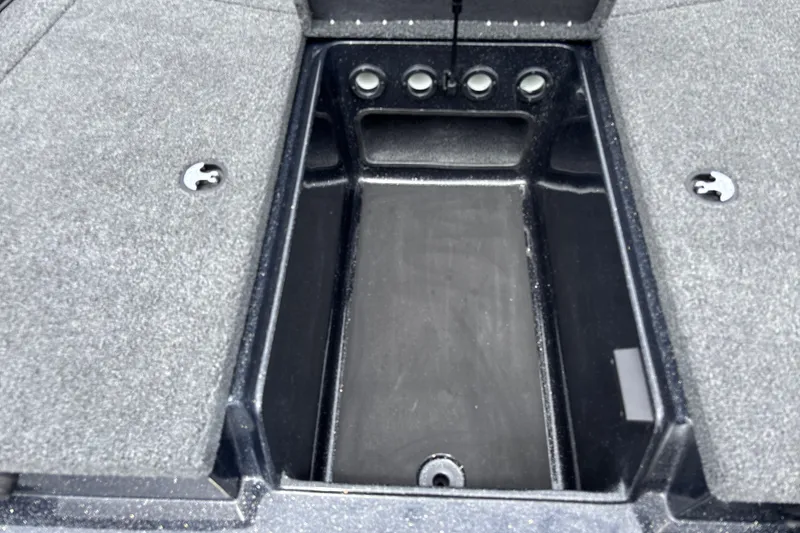 Slide: The Image of Interior storage compartment of a 2026 Nitro Z17 boat, featuring a spacious, carpeted design. - 19