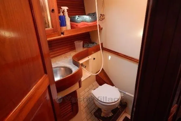 Slide: The Image of 1992 Hans Christian Christina yacht bathroom with wooden cabinetry and compact design. - 9