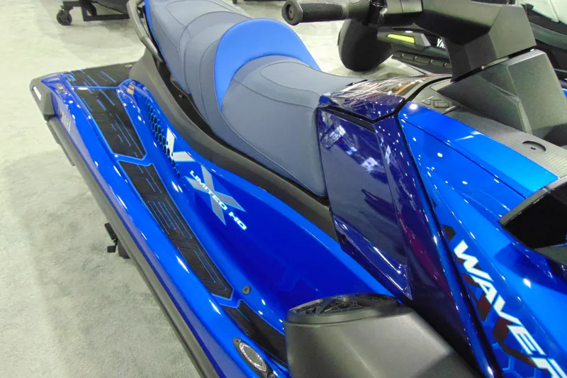 Slide: The Image of 2026 Yamaha WaveRunner VX Limited HO, blue jet ski, sleek design, close-up view. - 8
