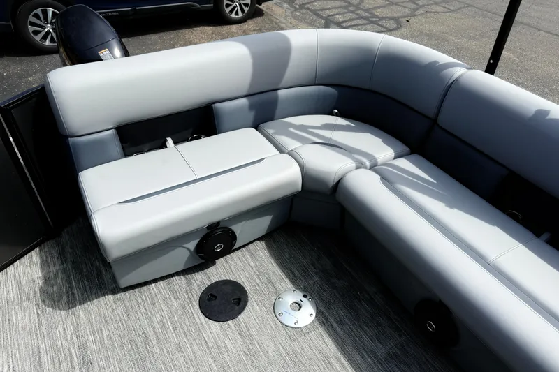 Slide: The Image of 2026 Bentley Pontoons Legacy 220 Cruise XL interior with luxurious gray seating. - 18