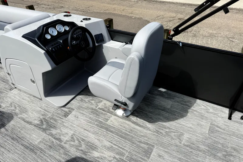 Slide: The Image of 2026 Bentley Pontoons Legacy 220 Cruise XL interior with modern helm and seating. - 19