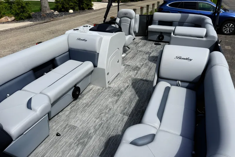 Slide: The Image of 2026 Bentley Pontoons Legacy 220 Cruise XL interior with luxurious seating and modern design. - 6