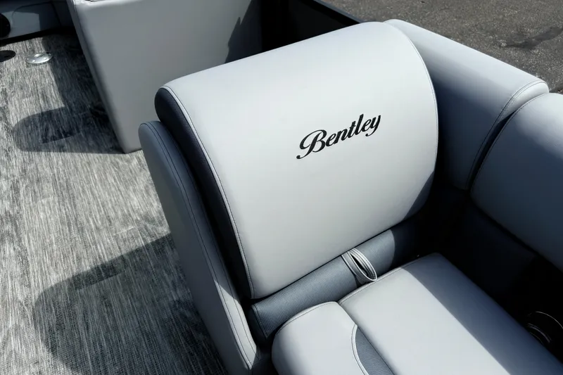 Slide: The Image of 2026 Bentley Pontoons Legacy 220 Cruise XL interior seating with elegant branding. - 9