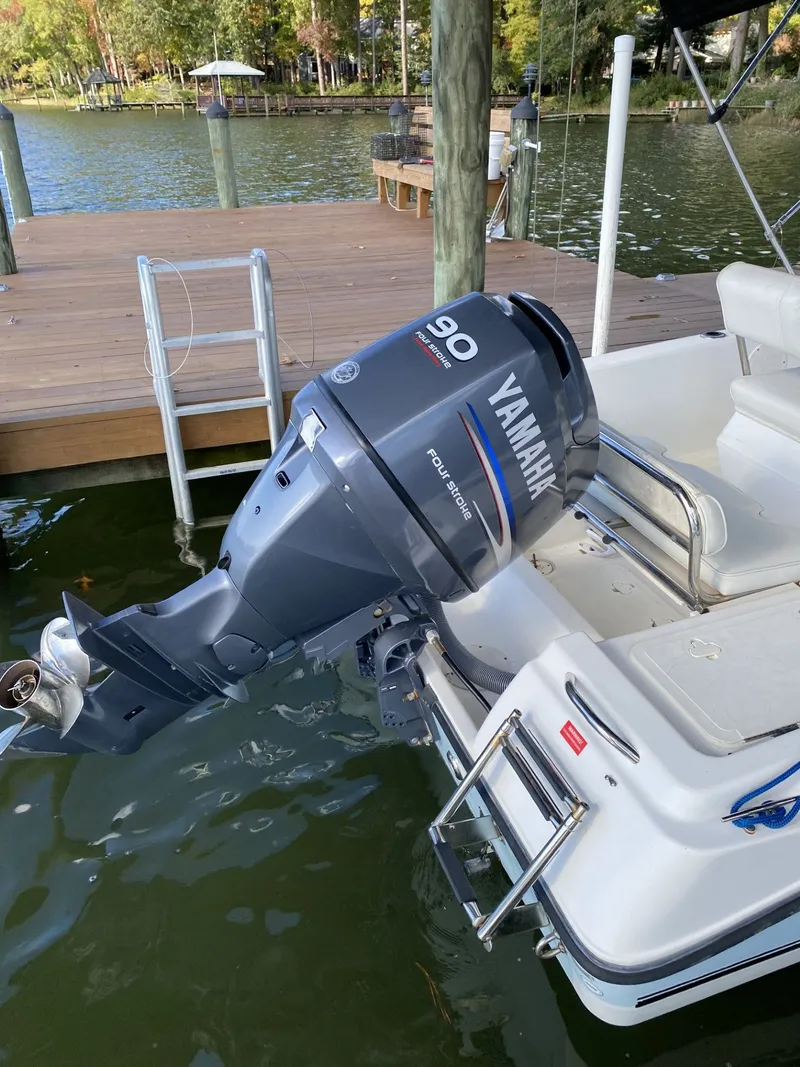 Slide: The Image of 2006 Century 17 CC boat with Yamaha outboard motor at dock. - 5