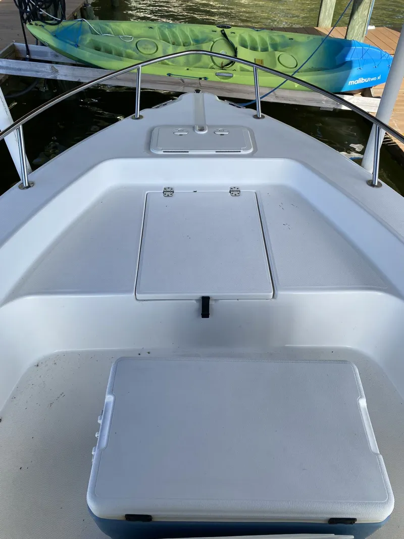Slide: The Image of 2006 Century 17 CC boat deck with kayak in background. - 7