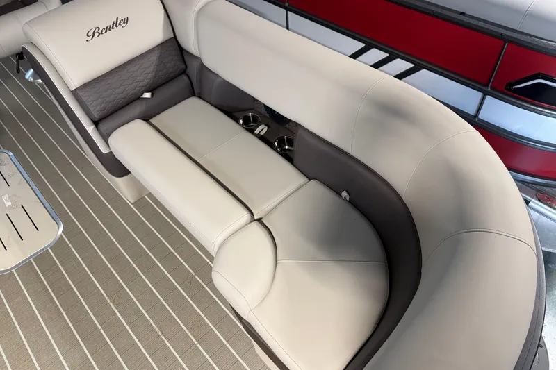 Slide: The Image of Luxurious seating on 2026 Bentley Pontoons Elite 223 Admiral, featuring elegant upholstery and cup holders. - 4