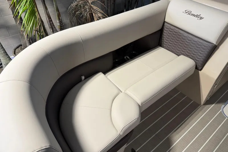 Slide: The Image of Luxurious seating on 2026 Bentley Pontoons Elite 223 Admiral, featuring elegant beige upholstery. - 5