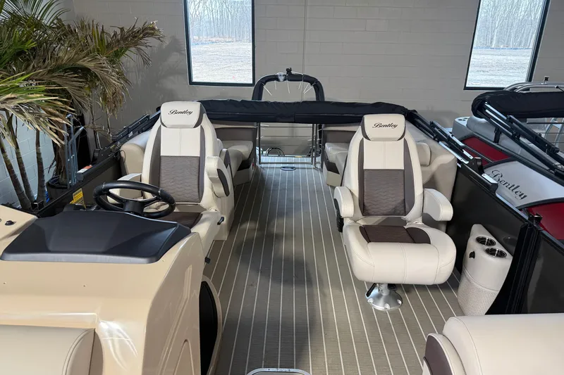 Slide: The Image of 2026 Bentley Pontoons Elite 223 Admiral interior with luxurious seating and modern design. - 8