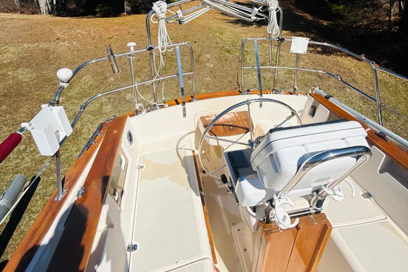 Slide: The Image of Cockpit of 1995 Island Packet 37 sailboat with navigation equipment and compass. - 14