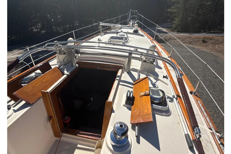Slide: The Image of Bow view of 1995 Island Packet 37 sailboat with anchor and winch. - 23