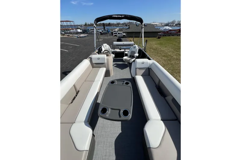 Slide: The Image of 2024 Princecraft Vectra 25 RL pontoon boat with spacious seating and modern design. - 9