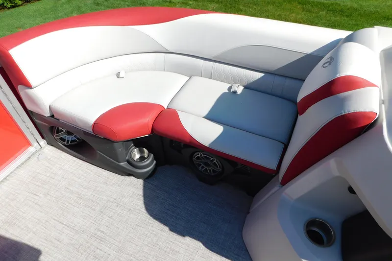 Slide: The Image of Luxurious seating on 2023 Tahoe Pontoon 2385 LTZ Quad Lounger with red and white upholstery. - 31
