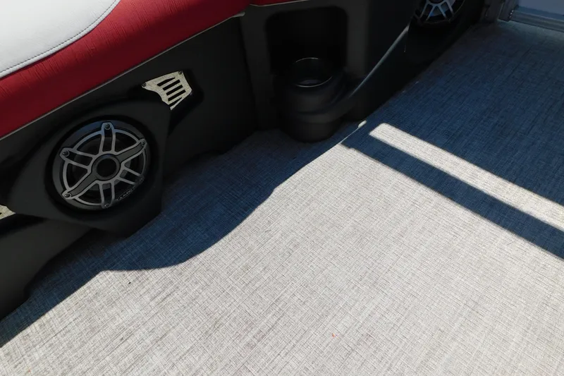 Slide: The Image of Interior of 2023 Tahoe Pontoon 2385 LTZ Quad Lounger with speaker and cup holder. - 40