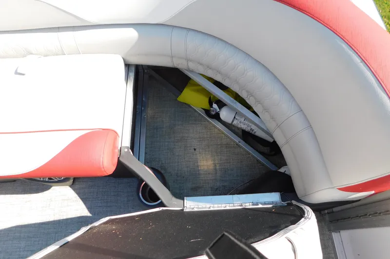Slide: The Image of 2023 Tahoe Pontoon 2385 LTZ Quad Lounger interior seating and storage view. - 14