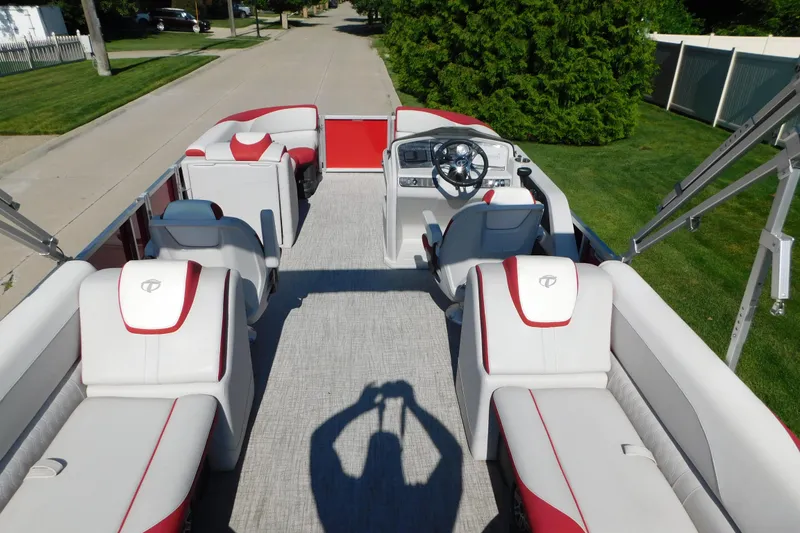 Slide: The Image of 2023 Tahoe Pontoon 2385 LTZ Quad Lounger with stylish seating and modern dashboard. - 47