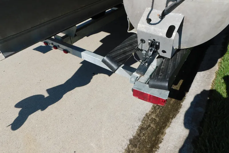 Slide: The Image of Rear view of 2023 Tahoe Pontoon 2385 LTZ Quad Lounger on a trailer. - 57