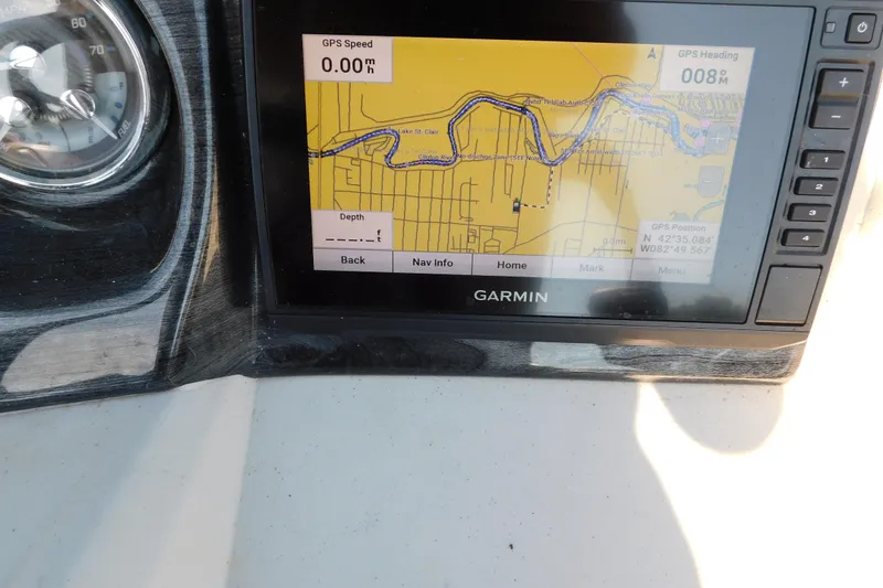 Slide: The Image of Garmin GPS display on 2023 Tahoe Pontoon 2385 LTZ Quad Lounger dashboard. - 24