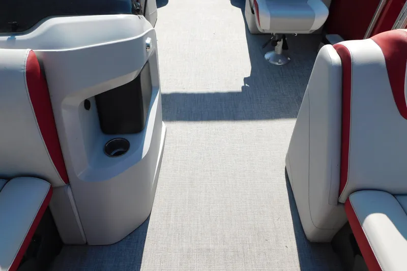 Slide: The Image of Interior of 2023 Tahoe Pontoon 2385 LTZ Quad Lounger with red and gray seating. - 48