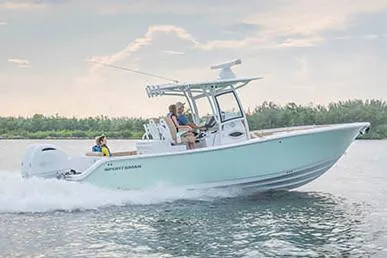 Slide: The Image of Manufacturer Provided Image: 2020 Sportsman Open 282 Center Console boat cruising on water with passengers. - 15