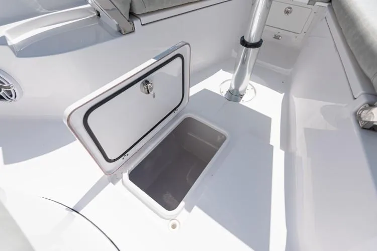 Slide: The Image of Manufacturer Provided Image: Open storage compartment on a 2020 Sportsman Open 282 Center Console boat. - 20