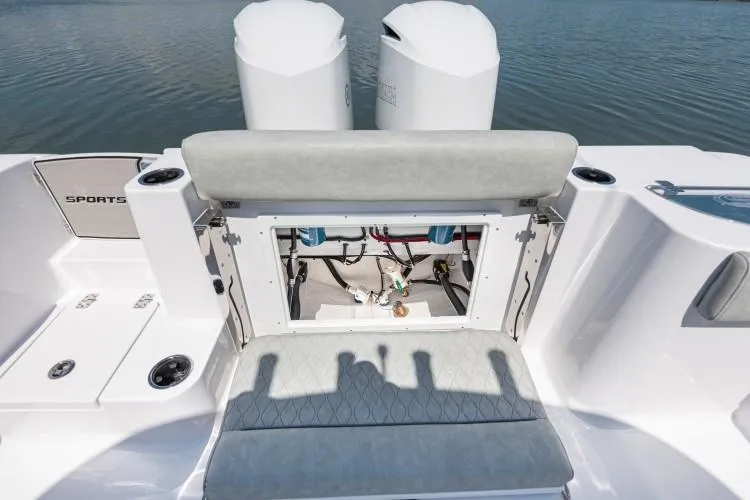 Slide: The Image of Manufacturer Provided Image: 2020 Sportsman Open 282 Center Console boat with open rear storage compartment. - 25
