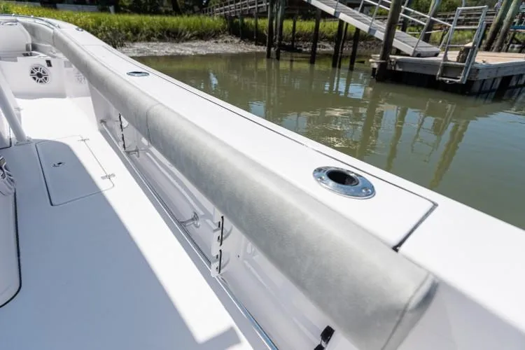 Slide: The Image of Manufacturer Provided Image: 2020 Sportsman Open 282 Center Console boat docked by a pier. - 27