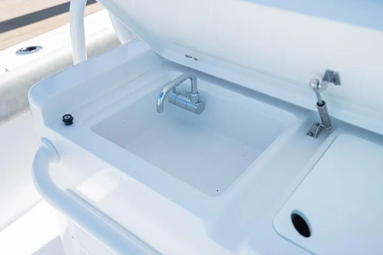 Slide: The Image of Manufacturer Provided Image: 2020 Sportsman Open 282 Center Console boat sink and faucet. - 28
