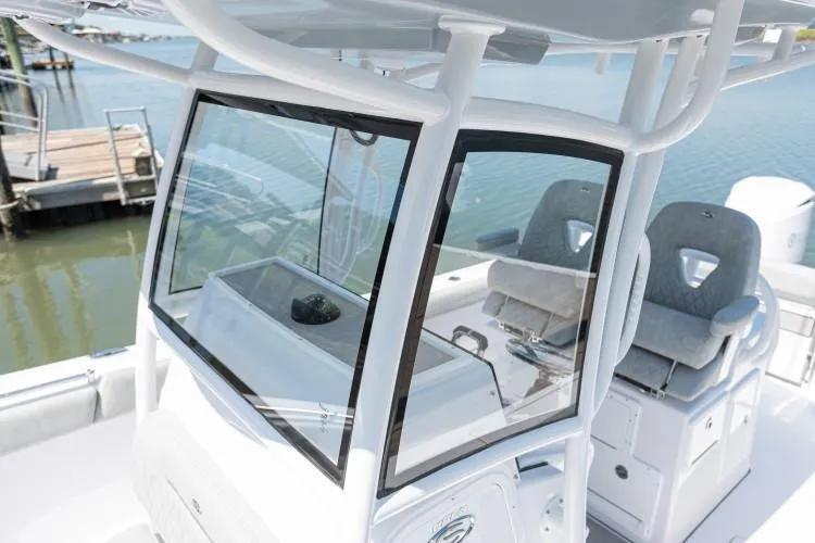Slide: The Image of Manufacturer Provided Image: 2020 Sportsman Open 282 Center Console boat interior with helm and seating. - 33