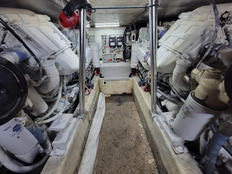 Slide: The Image of Engine room of a 1991 Ocean Yachts 42 Super Sport with twin engines. - 24