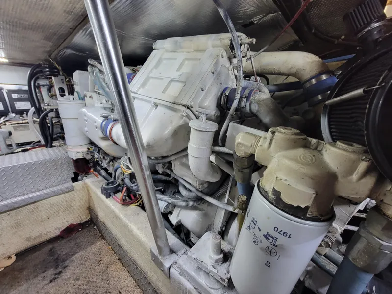 Slide: The Image of Engine room of a 1991 Ocean Yachts 42 Super Sport boat. - 26