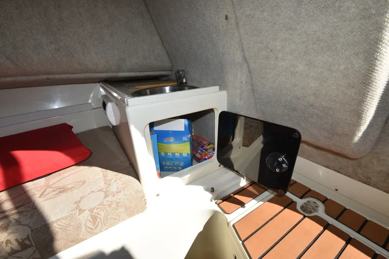 Slide: The Image of Interior of 2007 Shamrock 246 Adventurer with sink and storage. - 30