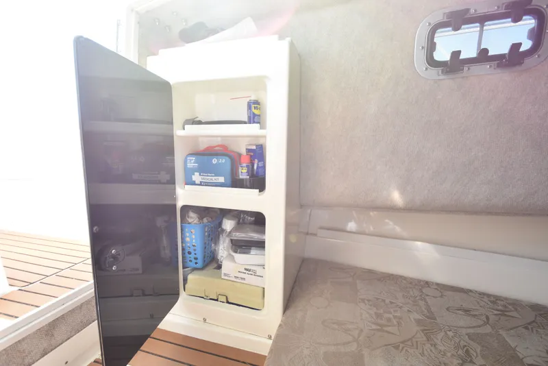 Slide: The Image of Interior of 2007 Shamrock 246 Adventurer with storage and accessories. - 33