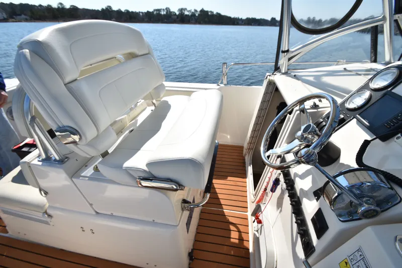 Slide: The Image of Interior of 2007 Shamrock 246 Adventurer boat with helm station. - 39