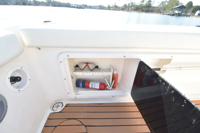 Slide: The Image of Storage compartment on a 2007 Shamrock 246 Adventurer boat. - 41