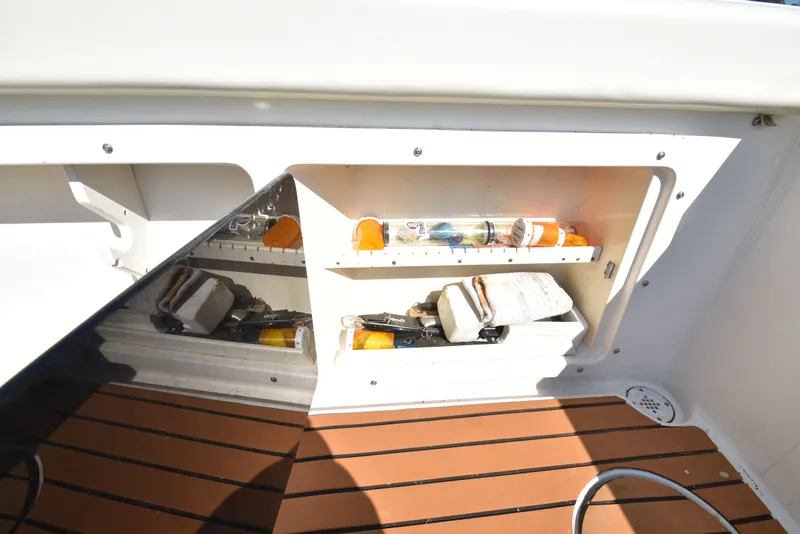 Slide: The Image of Storage compartment in Shamrock 246 Adventurer boat, year 2007. - 42