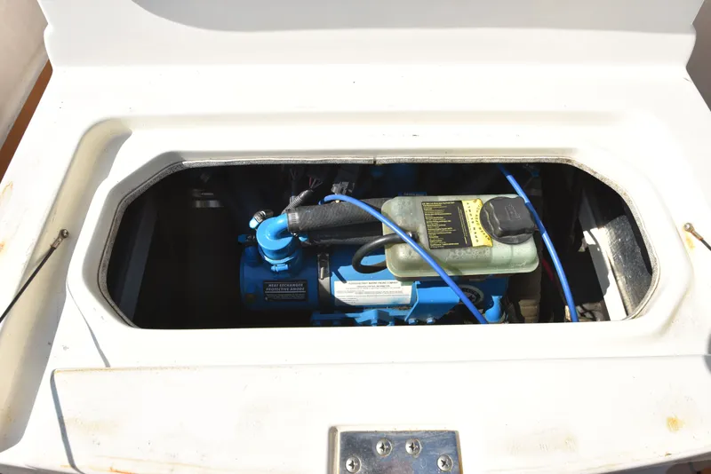 Slide: The Image of Engine compartment of a 2007 Shamrock 246 Adventurer boat. - 43