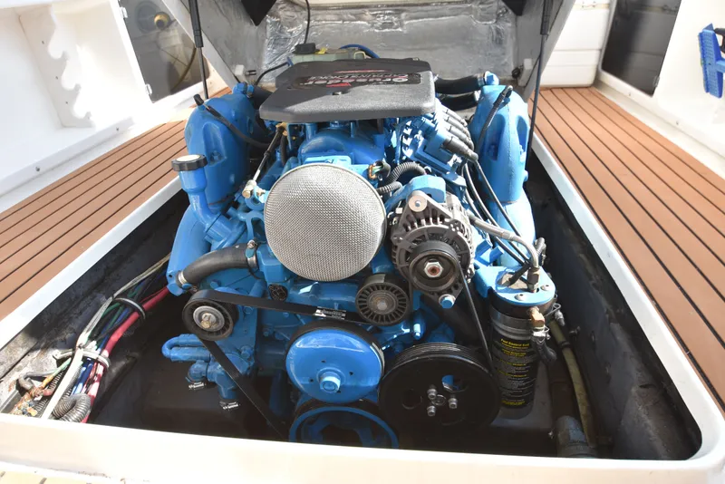 Slide: The Image of Engine of a 2007 Shamrock 246 Adventurer boat. - 46