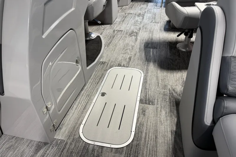 Slide: The Image of Interior of 2026 Bentley Pontoons Elite 223 Admiral, featuring sleek flooring and seating. - 5