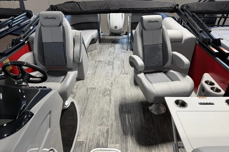 Slide: The Image of Interior of 2026 Bentley Pontoons Elite 223 Admiral, featuring luxurious seating and modern design. - 6