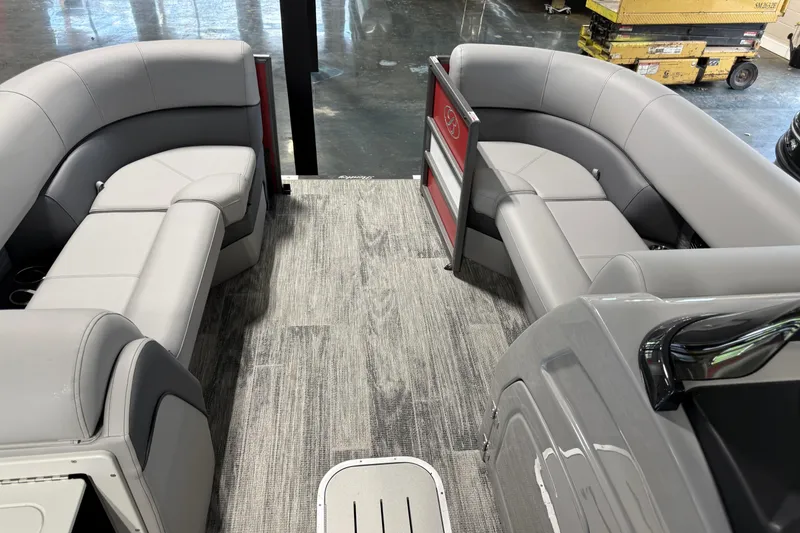 Slide: The Image of 2026 Bentley Pontoons Elite 223 Admiral interior with gray seating and modern flooring. - 7